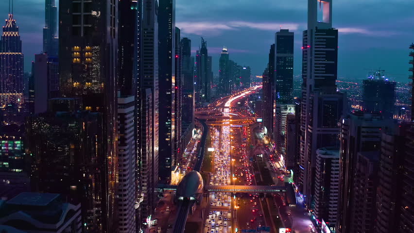 Aerial Shot Of Night Urban Skyline Landscape Traffic Moving Overpass Busy City Transport Dubai Business District Low Light Uhd Hdr 4k Royalty-Free Stock Footage #1025330447