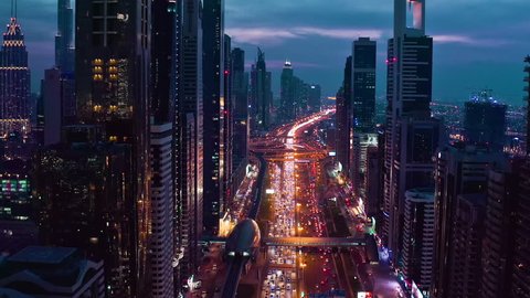 Aerial Shot Of Night Urban Skyline Landscape Traffic Moving Overpass Busy City Transport Dubai Business District Low Light Uhd Hdr 4k