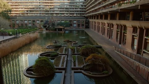 LONDON, circa 2019 - Wide shot of a suburban real estate development built next to an ecology park in Barbican, Central London, UK