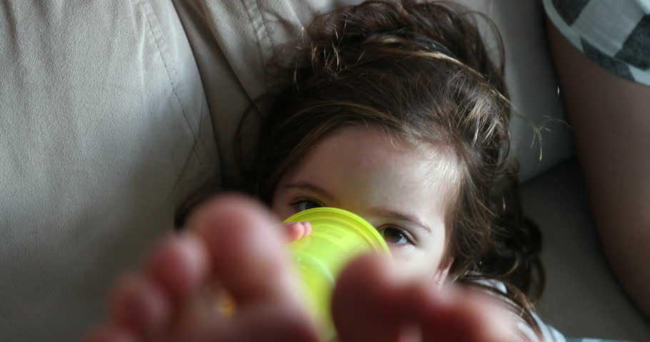Little girl showing her dirty little feet