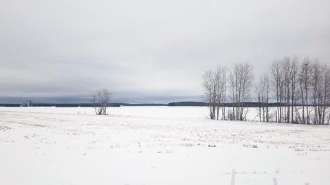 POV Train Ride in Canada Along the snow covered land in the winter.