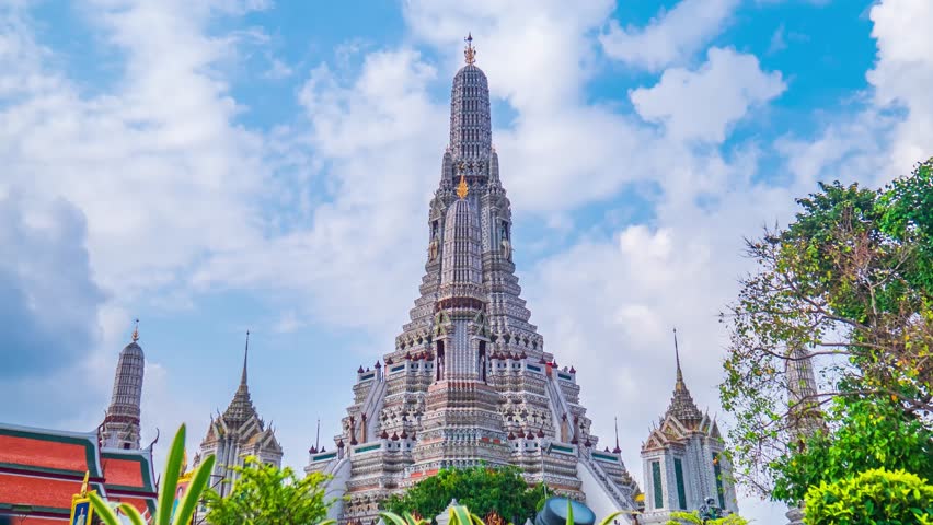 Wat Arun Temple with white cloudy and clear sky in bangkok Thailand, Wat Arun is among the best known of Thailand