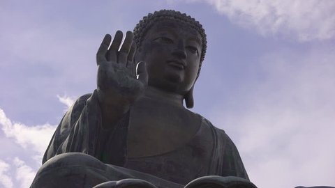 Tian Tan big Buddha statue on the peak. Close to Po Lin monastery. Dolly shot - October 2018: Lantau Island, Hong Kong, China 스톡 비디오