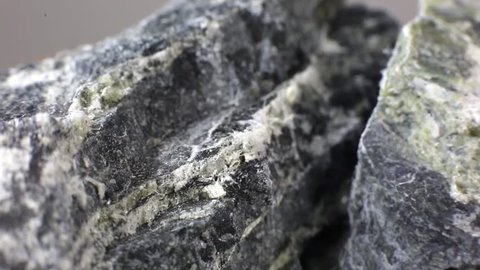 Mineral asbestos macro video. Harmful, dangerous minral. Asbestos fibers in rock close-up.