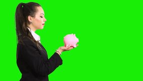 Business woman with piggy bank and euro isolated on green screen chroma key - Powered by Shutterstock - Get 15% off with code: PIKWIZARD15