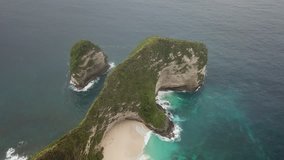 4K Aerial view of Kelingking Beach in Nusa Penida, Indonesia, cinematic drone shot 