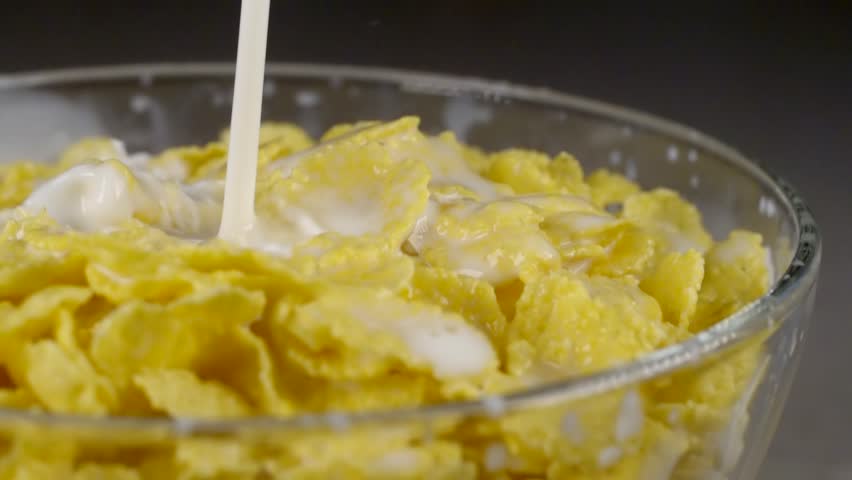 Making cornflakes for breaksfast.