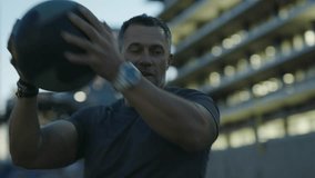 Urban Street Workout / Man 50's working out on night streets of Downtown Los Angeles  - Powered by Shutterstock - Get 15% off with code: PIKWIZARD15