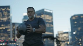 Urban Street Workout / Man 50's working out on night streets of Downtown Los Angeles  - Powered by Shutterstock - Get 15% off with code: PIKWIZARD15