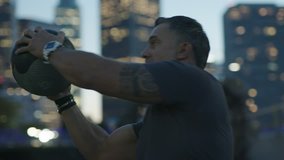 Urban Street Workout / Man 50's working out on night streets of Downtown Los Angeles  - Powered by Shutterstock - Get 15% off with code: PIKWIZARD15