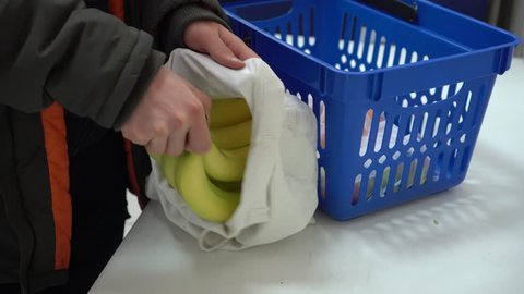 Shopping Without Plastic Bags In Grocery Store. Reusable Canvas Produce Bags