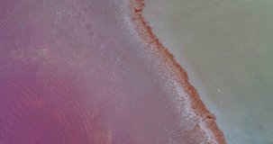coastal line of pink laguna , areal shoot , drone video 4k uhd , pink laguna in Spain with sand coast line 