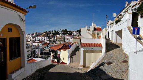 Carvoeiro, Algarve, south of Portugal - February - 2018: Driving trought Carvoeiro, located in the Algarve coast, south of Portugal.  Once a small fishing village, now become a cosmopolitan resort.