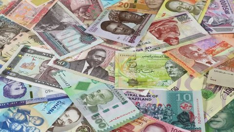 Africa currency notes slow rotating. African money, trade, economy, market. Low angle. 4K stock video footage