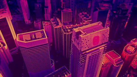Aerial view of skyscrapers at the Kuala Lumpur city in the 80s style video, neon colors. Wide shot 4k shot