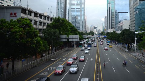 SHENZHEN, CHINA - MAY 15, 2012 Time Lapse Aerial View Shenzhen Office Buildings Cars Traffic Jam on Busy Street