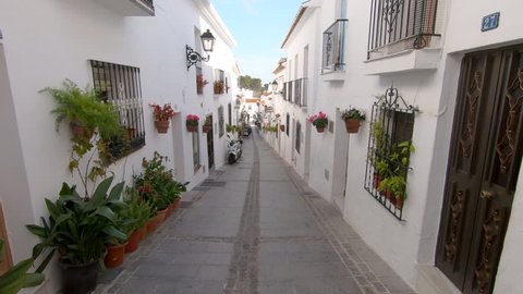 Panning view of street in Mijas Pueblo on Costa del Sol in Spain.