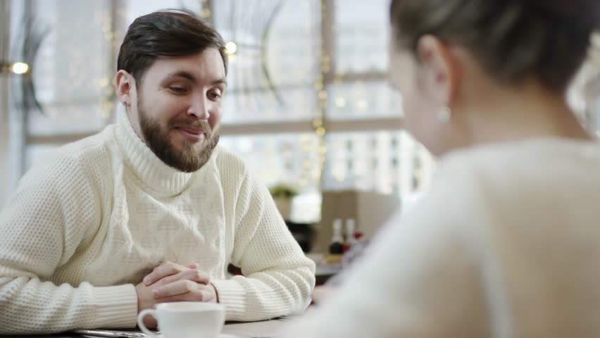 Adult happy man kissing his wife