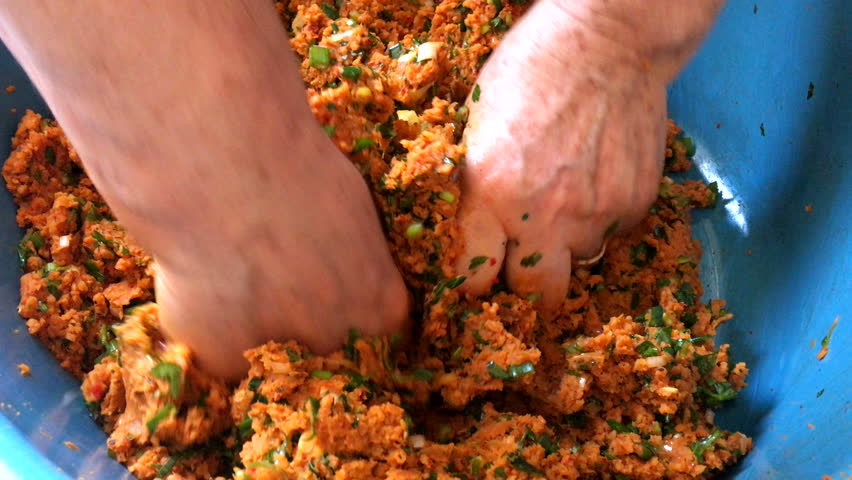 making turkish food lentil ball, turkish lentil meatballs, dolmades food, grape leaf stuffing