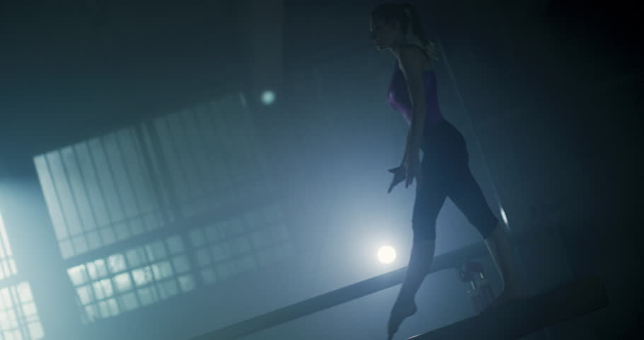 Fit Sporty Female Walking On Balance Beam Sports Center Skill Practice Precision Gymnastics Competitive Mindset Concept 4k