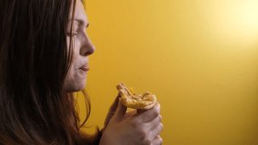 Piece Pizza . happy girl lifestyle eating a slice of pizza concept. woman hungry eats a slice of pizza. slow motion video. pizza fast food concept