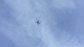 Flying drone in sky