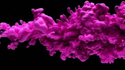 Super slowmotion shot of purple ink in water. Shot with high speed camera at 4K.
