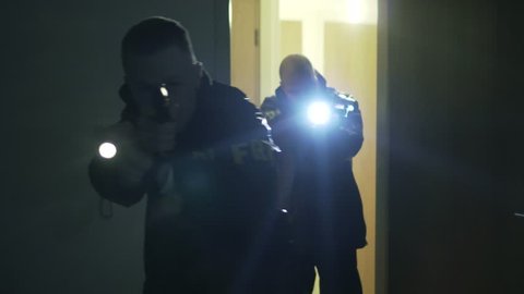 Cinematic Police Officers Stealth Raid Maneuver Armed With Guns At Night, 4K.
