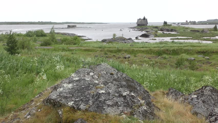 KEM, REPUBLIC OF KARELIA, RUSSIA - JUNE 24, 2018: "The Island" in the village of Rabocheostrovsk, Kem. View from the White Sea during a storm, Arkhangelsk Region, Russia
