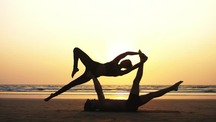 somersault-pose-of-young-women-on-beach image - Free stock photo ...