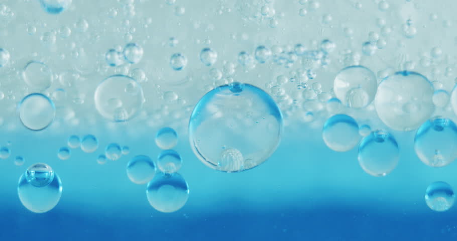 Slow motion macro of micro particles molecules in a liquid are analyzed with microscope for research of skincare and beauty cosmetics in scientific laboratory. Shot in 8K. | Shutterstock HD Video #1025621030