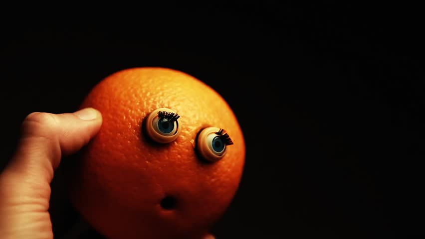 orange plastic eyes hand 