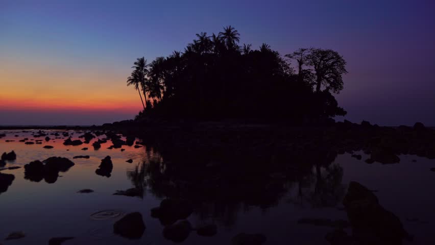 Beautiful light sunset over tropical small island
