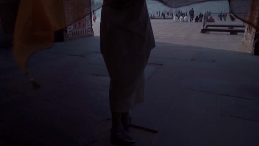 Indian Woman in traditional Sari in front of Taj Mahal, Agra, Uttar Pradesh, India