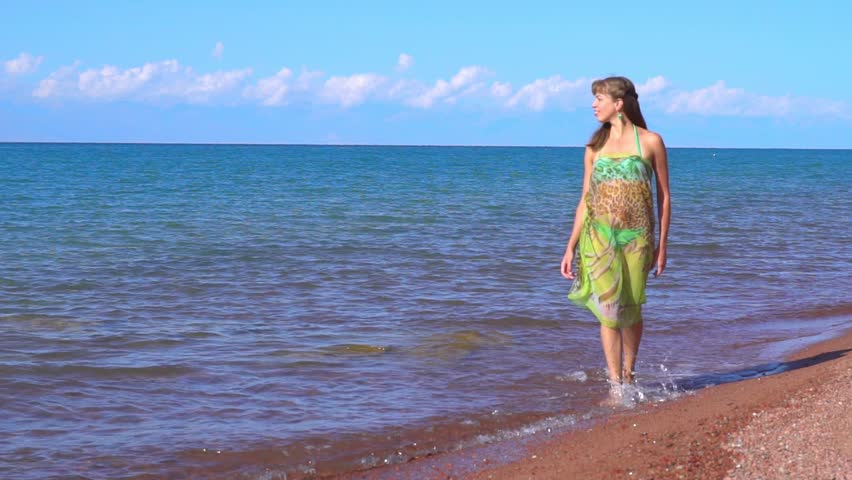 girl walking on the beach