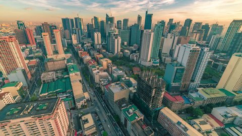 Panorama of the City of Manila with skyscrapers early in the morning, Luzon island, Philippines. Aerial view Timelapse 4K