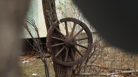 Fan windmill with old chariot wheel
