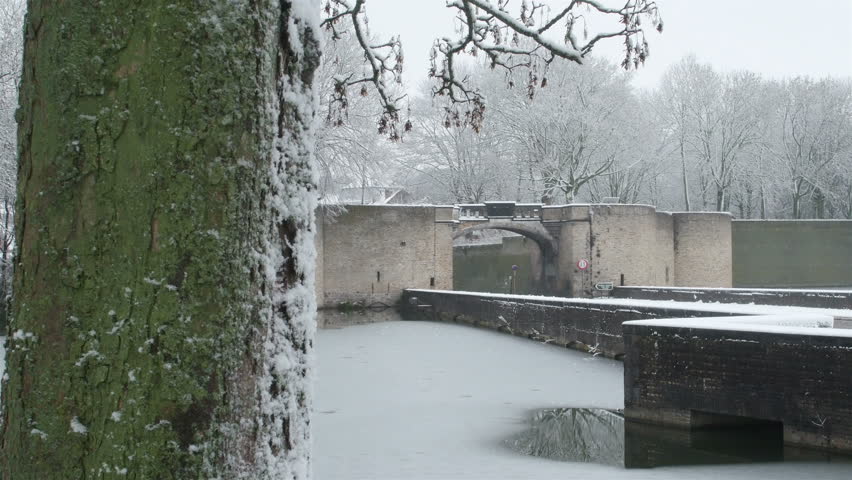 Public park and nature surrounding Ypres city in Belgium, after snow fall