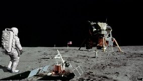 Astronaut walking on the moon and waving his hand. Some Elements of this video furnished by NASA