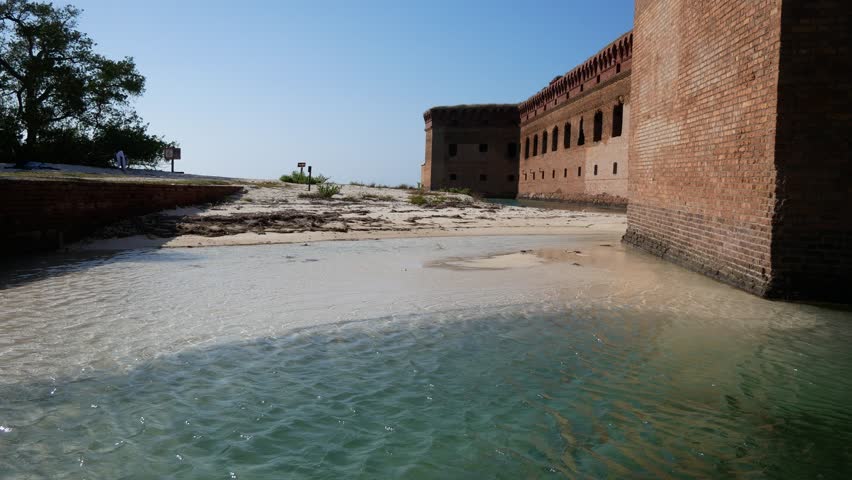 Landscape view of the moat outside of Fort Jefferson during the day in Dry Tortugas National Park (Florida).