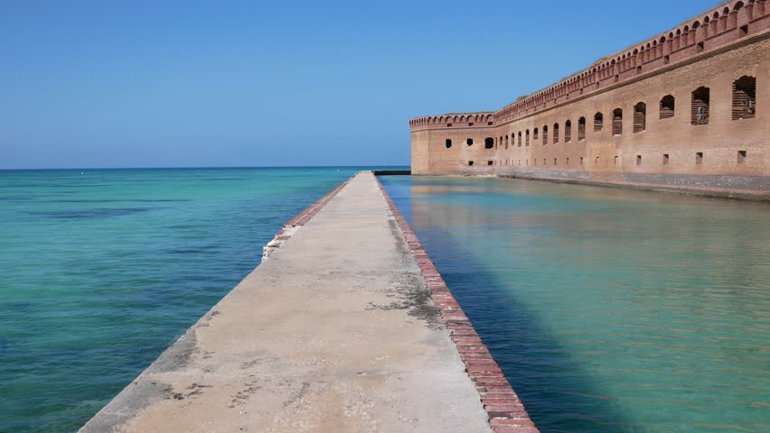 Landscape view of the moat outside of Fort Jefferson during the day in Dry Tortugas National Park (Florida).
