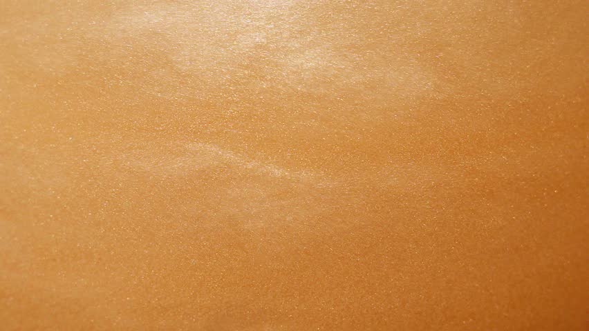 abstract the Golden sand runs bright shiny waves poured from one side to the other Royalty-Free Stock Footage #1025755508