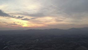 Beautiful dawn colors above Deli Jovan and Stol mountains 4K aerial video