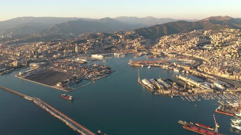 GENOA, ITALY - JANUARY 3, 2019. Aerial view of harbour and city in the evening
