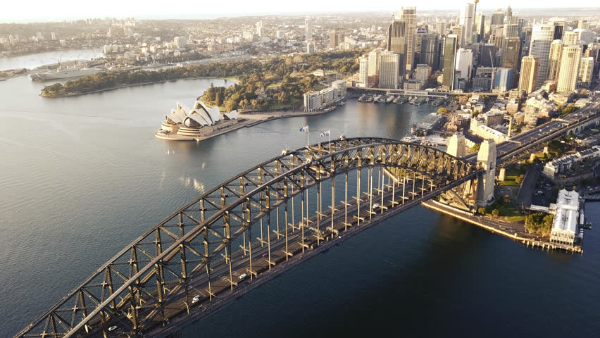 4k aerial cinematic drone footage b-roll of Sydney Harbour Bridge during sunrise. 
 Royalty-Free Stock Footage #1025772368