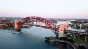 4k aerial cinematic drone footage b-roll of Sydney Harbour Bridge during sunrise. 
