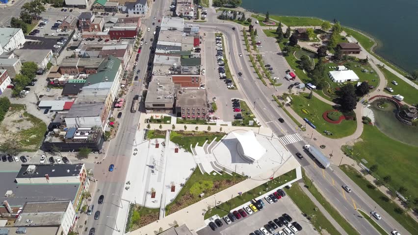 Flying with drone above downtown of Barrie and Lake Simcoe 4k