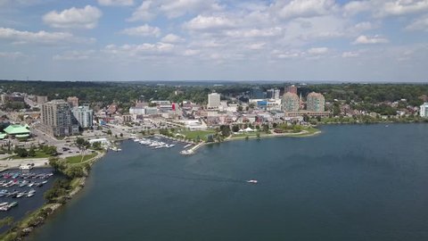 Flying with drone above downtown of Barrie and Lake Simcoe 4k