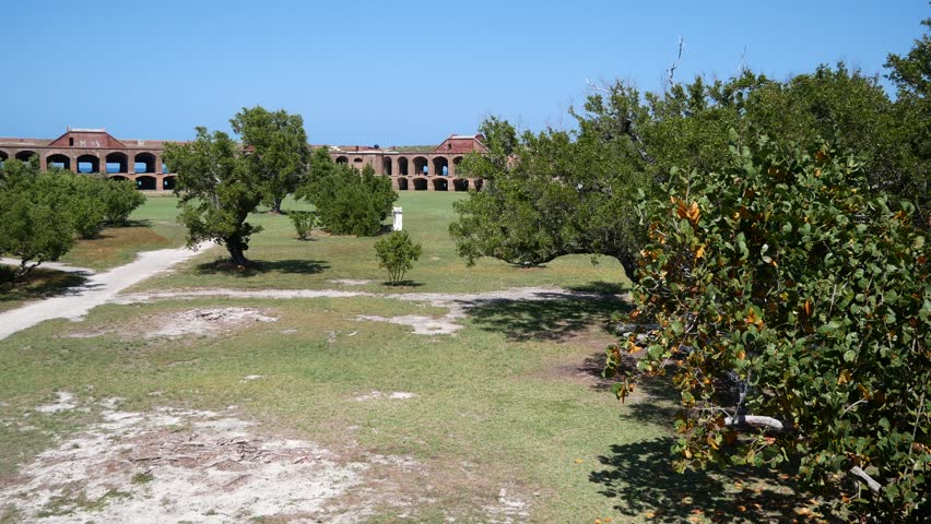 Panning landscape view of the structures and gardens inside of Fort Jefferson in Dry Tortugas National Park (Florida).