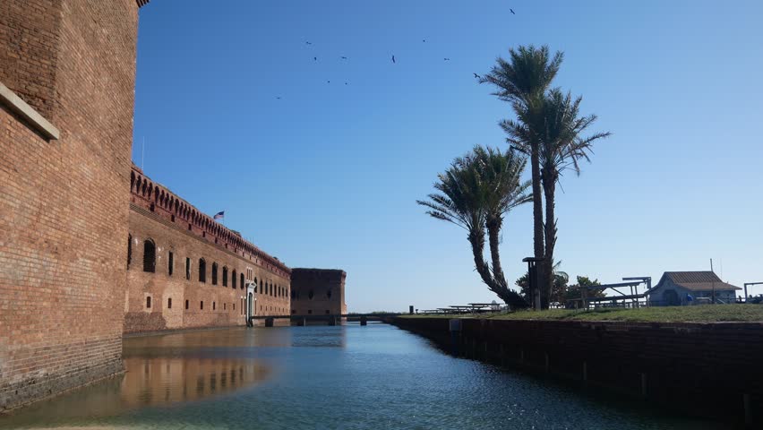 Landscape view of the moat outside of Fort Jefferson during the day in Dry Tortugas National Park (Florida).